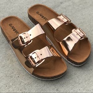 Rose gold size 11 shoe. Runs one size too small!